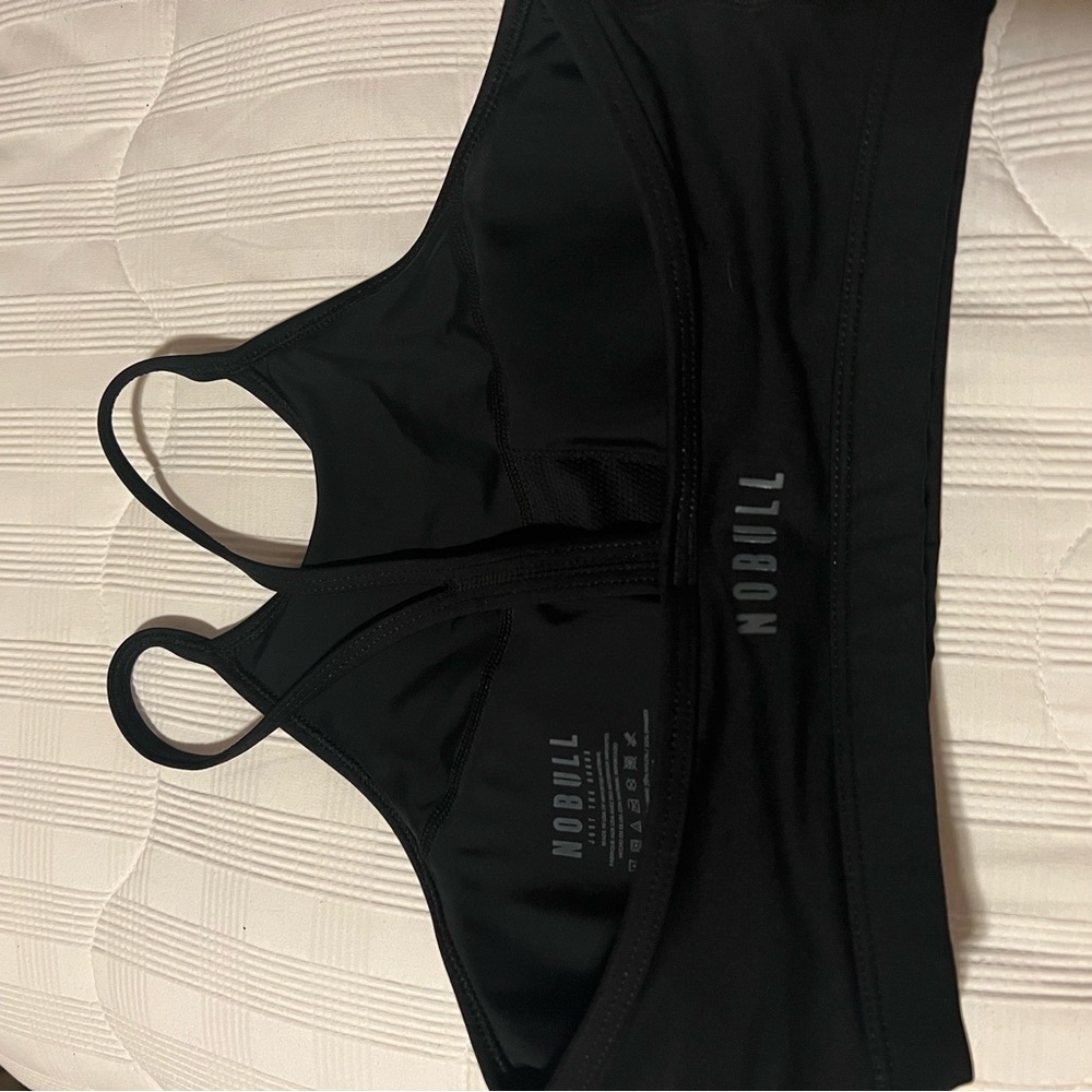 No bill sports bra . Light pads. Worn one